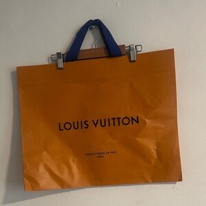 Louis Vuitton Orange Bag with Blue Ribbon Handles